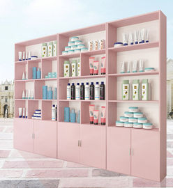 中国 白/ピンクの店の飾り戸棚、化粧品の店のための商業陳列ケース サプライヤー