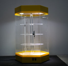 中国 導かれたライトとロックできる美しい回転アクリルの陳列台の棚の黄色の基盤 サプライヤー